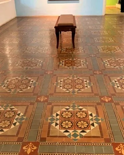 Understated restored stone pathways inside the gallery.